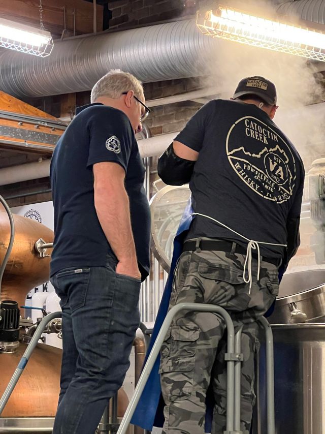 Image of individual making whisky.