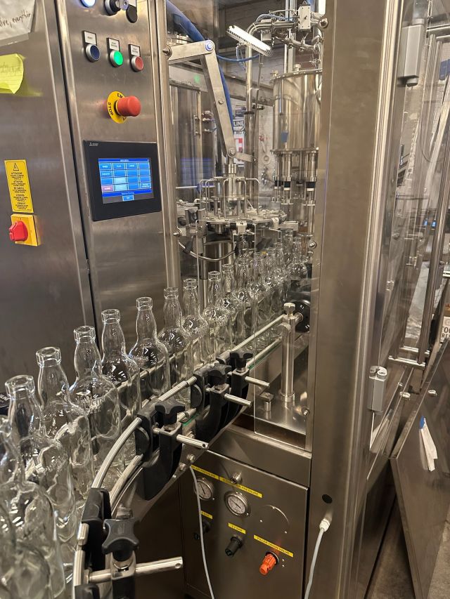 Image of individual making whisky.